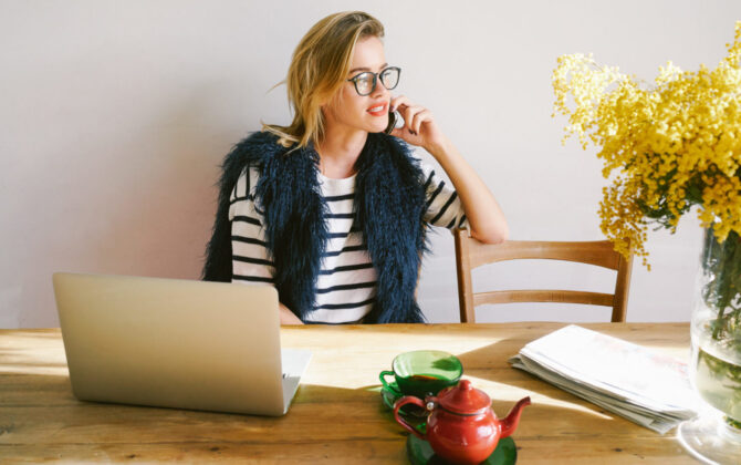 a young female student on the phone