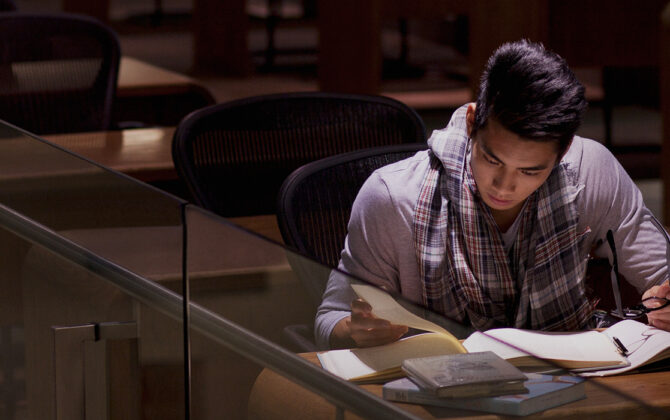 An MBA student studying in the classroom.