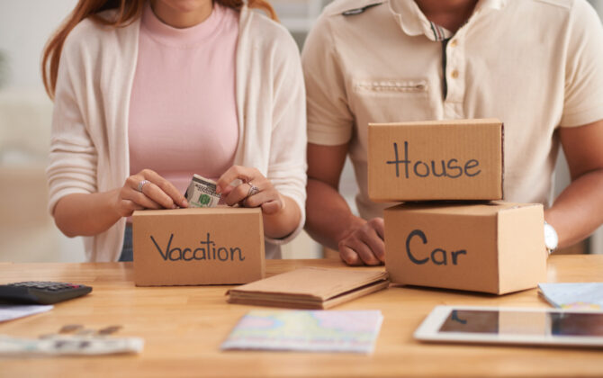 Couple saving cash in the vacation box, mortgage cash-out refinance vs. personal loans.