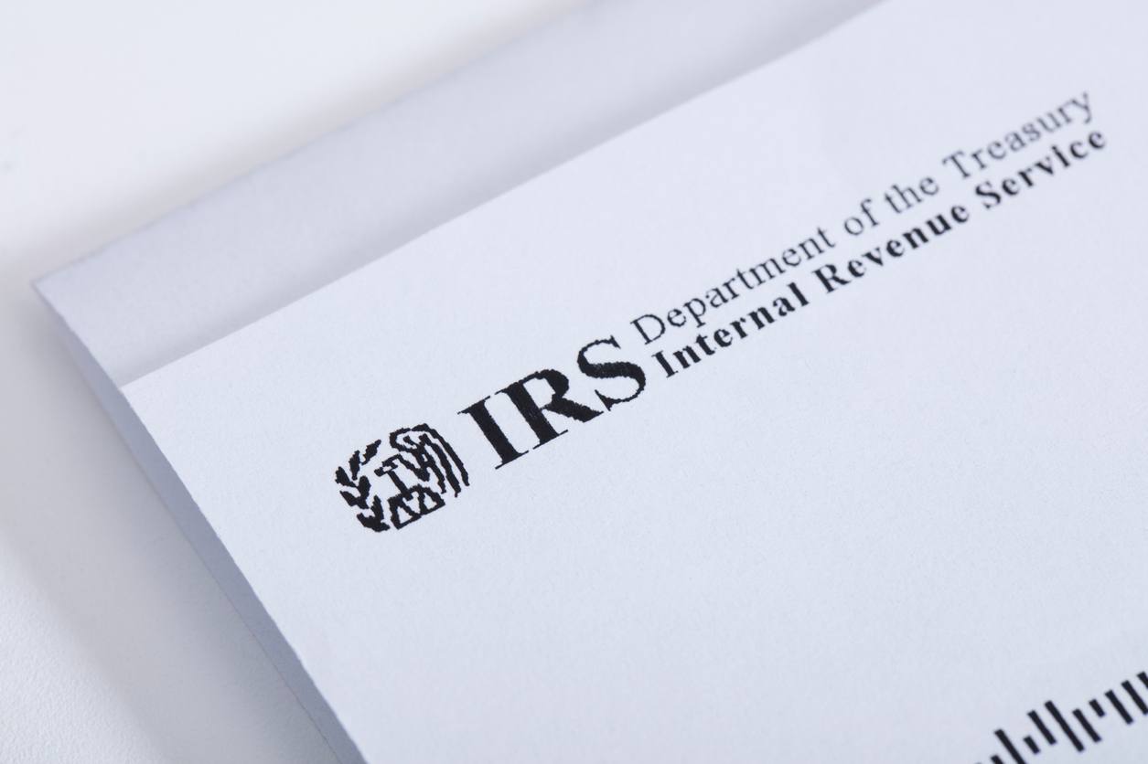 Image of a business card featuring the Internal Revenue Service's insignia