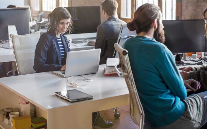 workspace area with people sitting and working