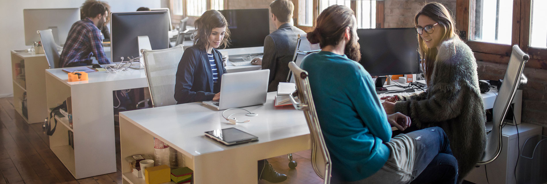 workspace area with people sitting and working