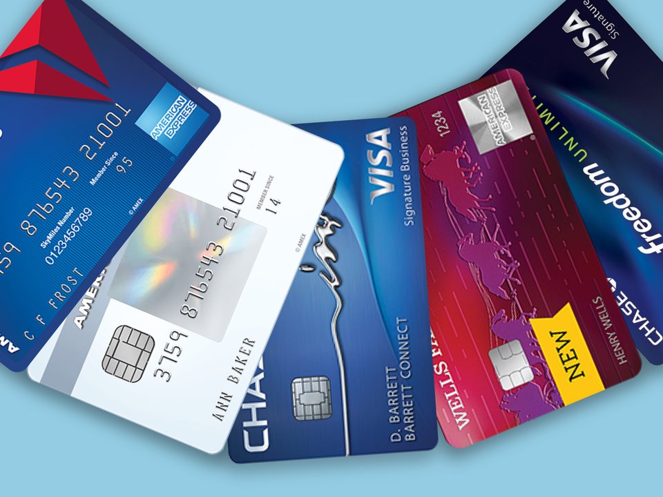 closeup on different company credit card lined up on a table