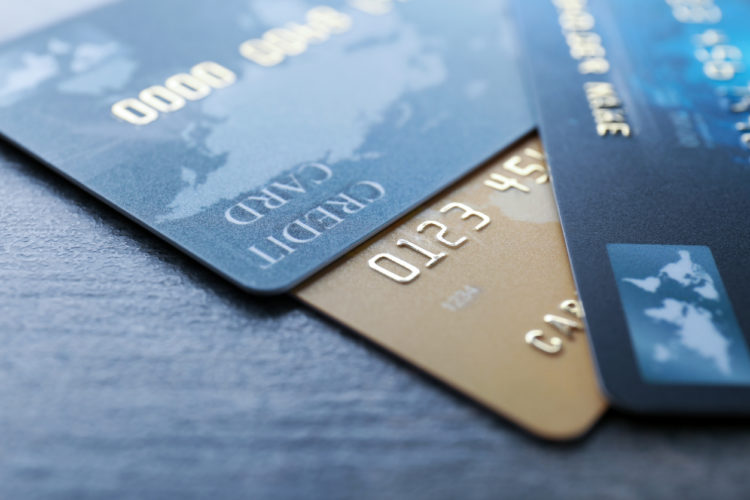 Three credit cards lying on the table