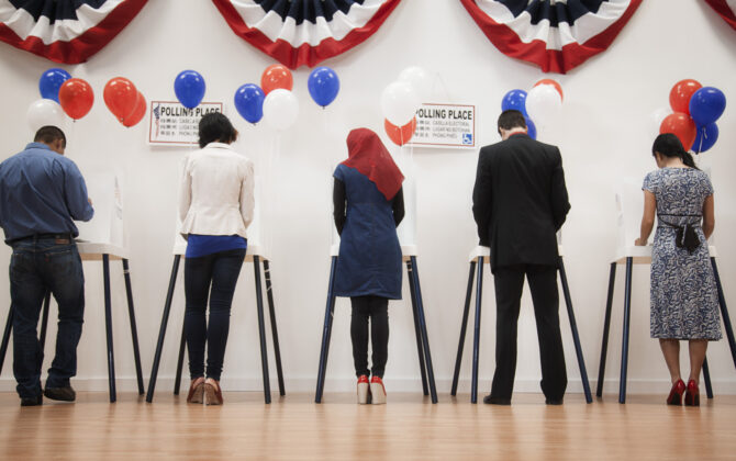 Voters voting in polling place