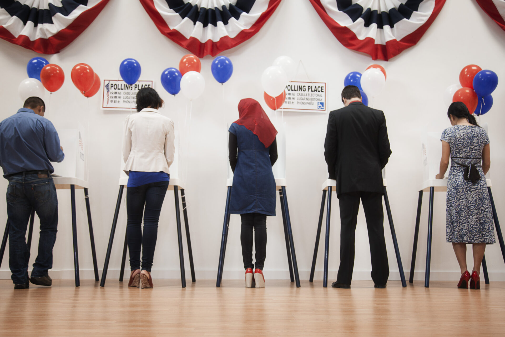 Voters voting in polling place