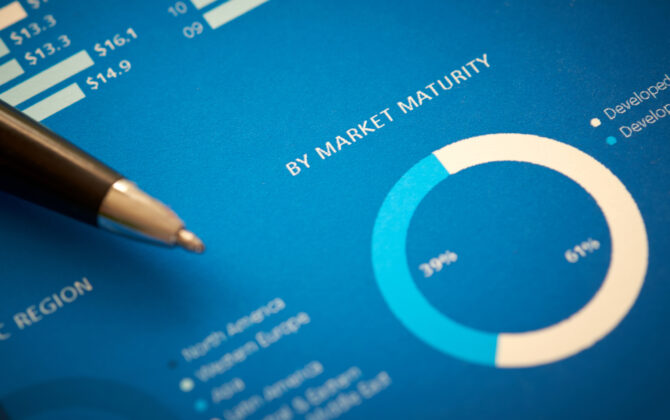 A close up of a business annual report on market maturity.