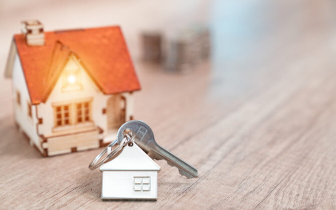 Miniature mortgage house with keys