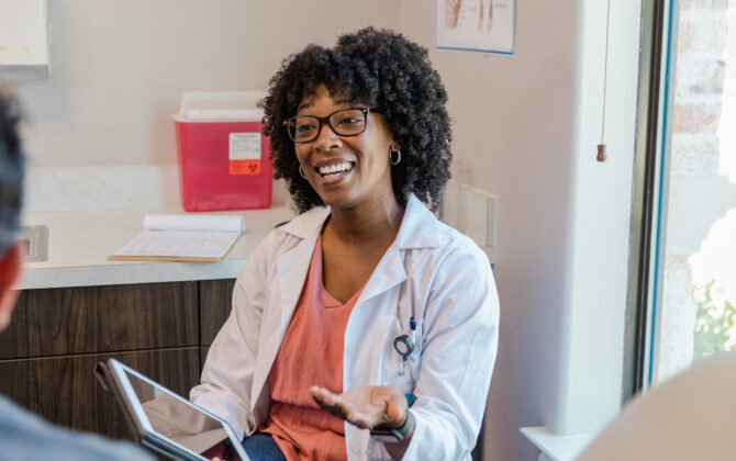 Nurse practitioner meets with patient