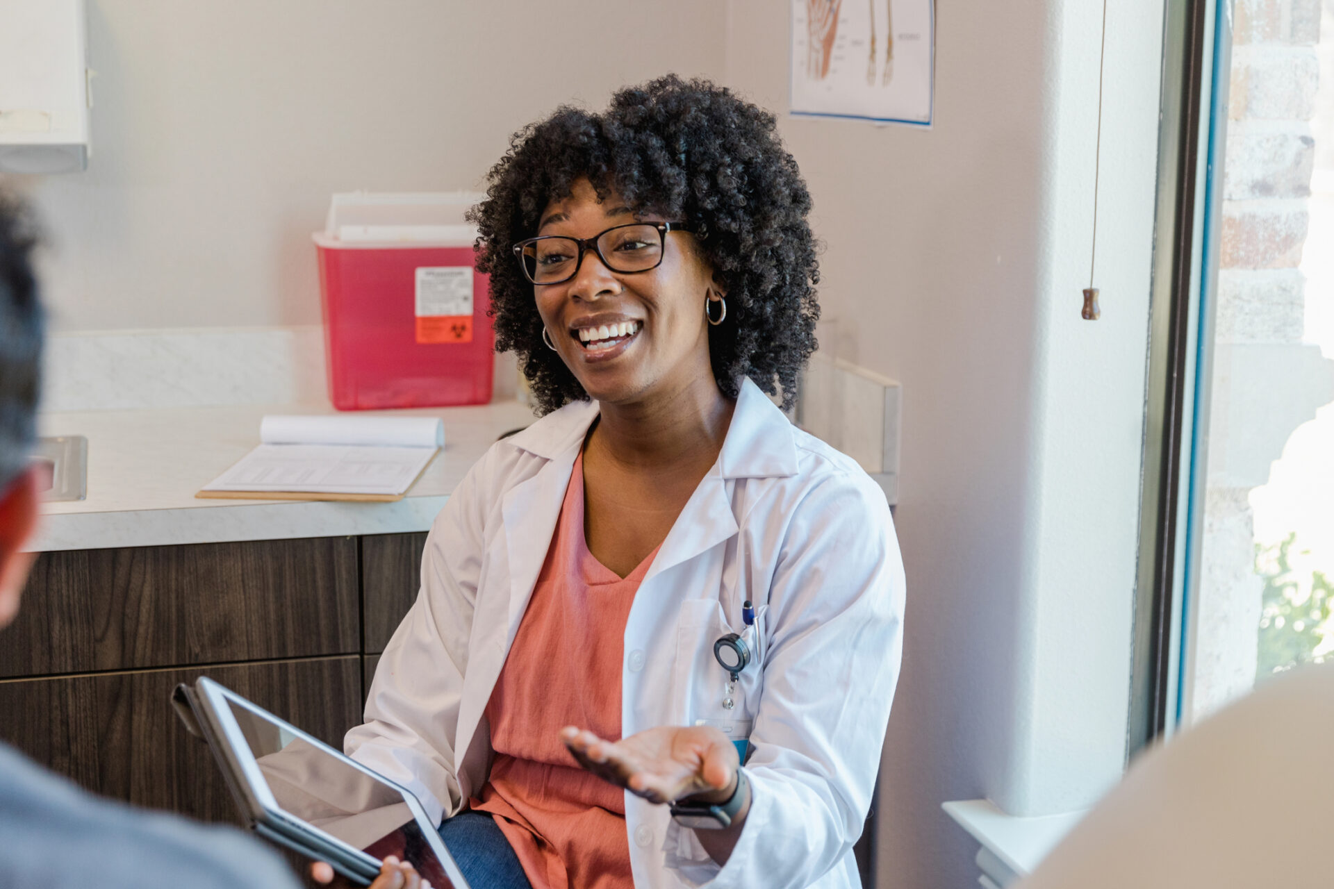 Nurse practitioner meets with patient