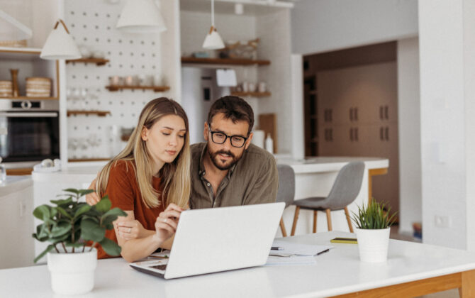 couple researching how to improve their credit score