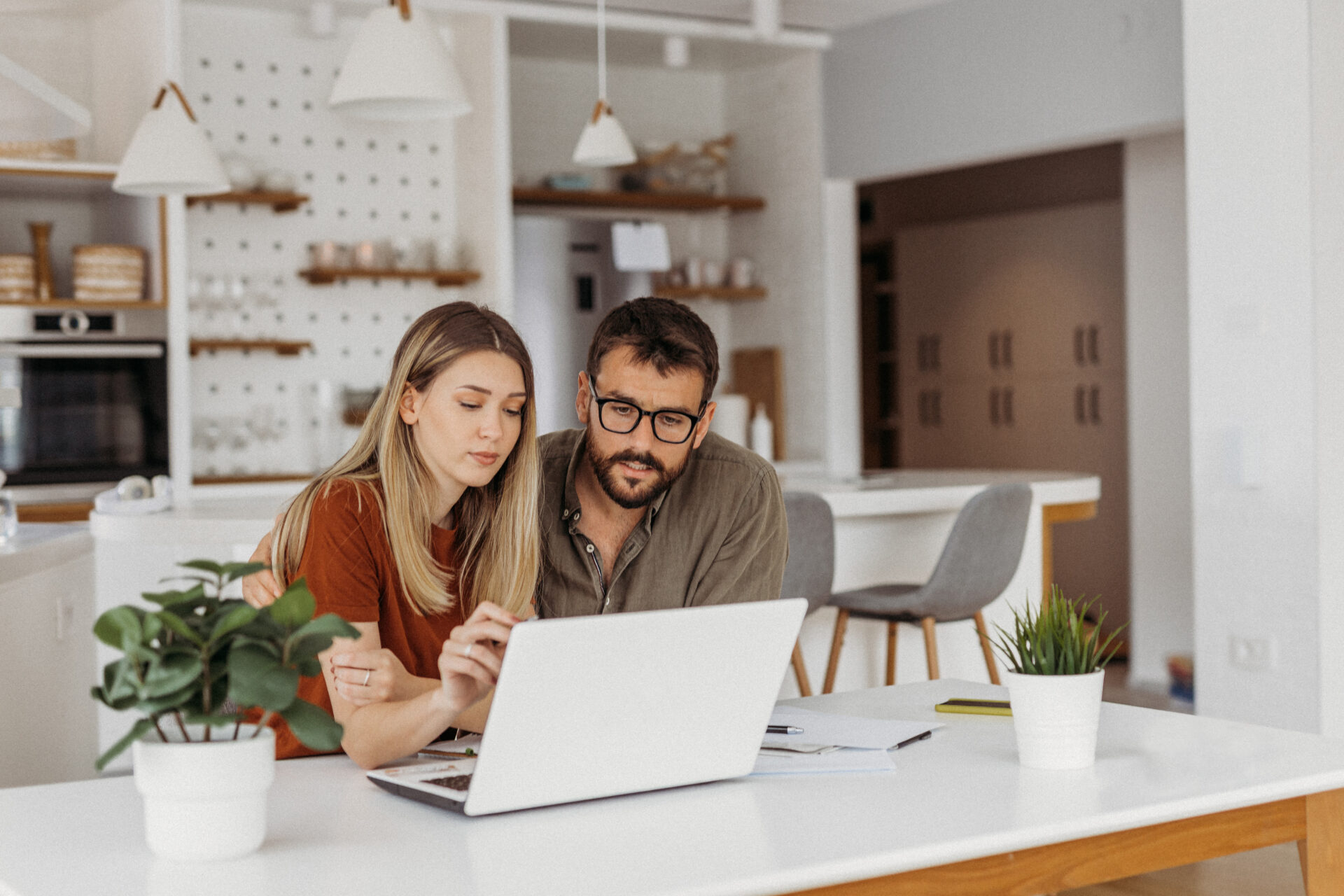 couple researching how to improve their credit score