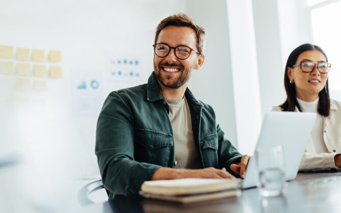 Happy professional manages student loan debt stress-free