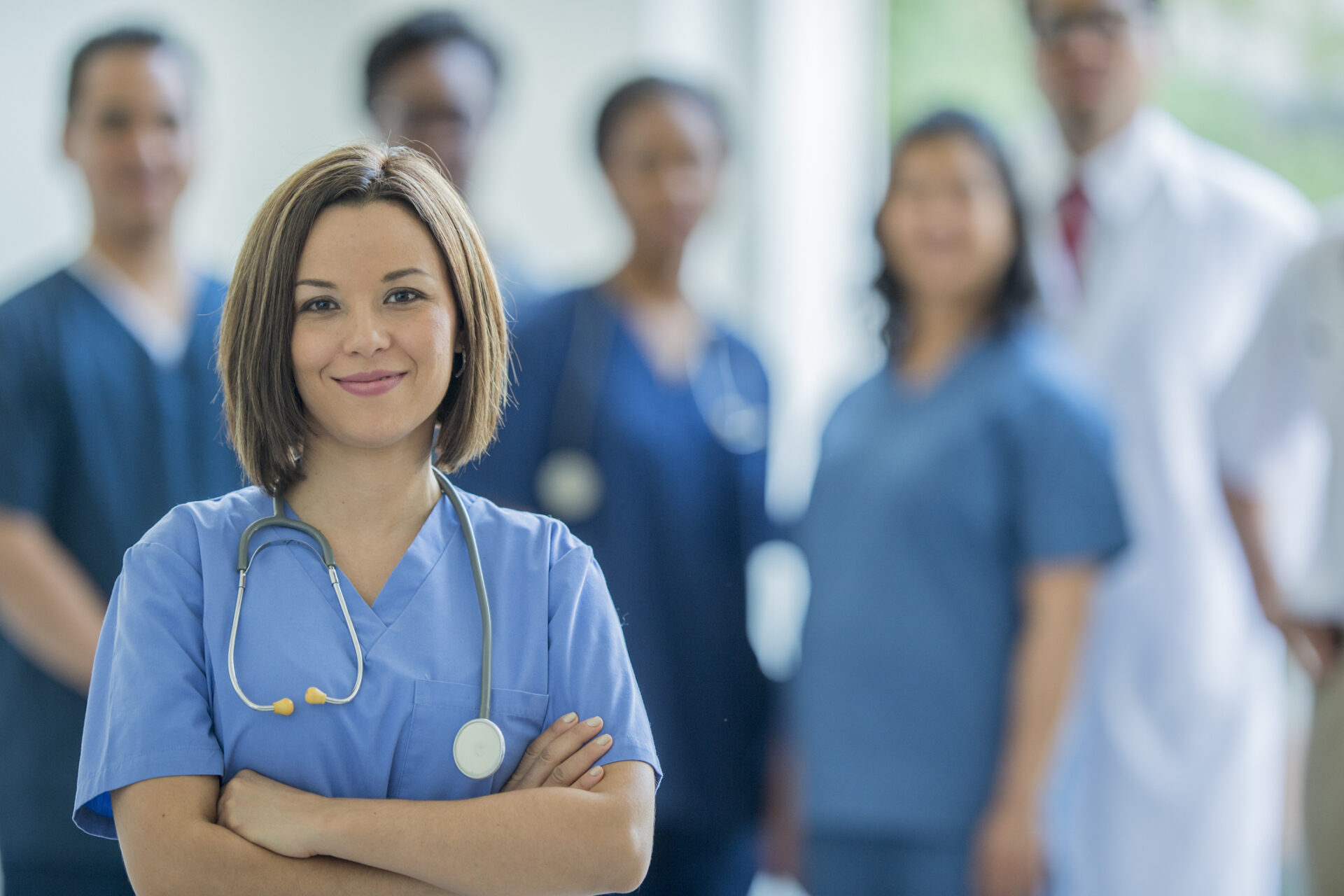 A Smiling Nurse illustrating how nurses can get student loan forgiveness