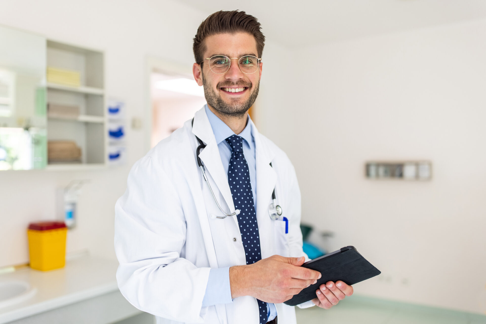 smiling doctor looking for student loan forgiveness