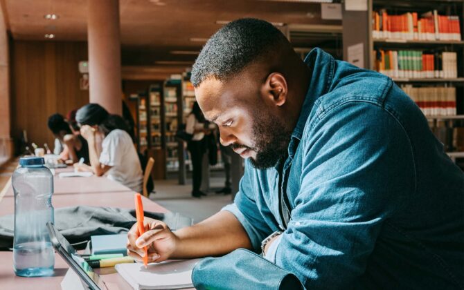 Young doctor learning about federal student loan repayment and forgiveness under SAVE plan